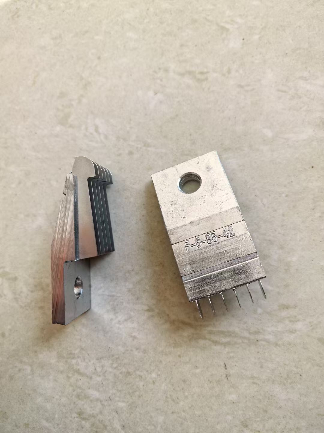 Pair of warp knitting needle blocks